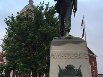 Confederate memorial; man with hat holding rifle upright on right shoulder