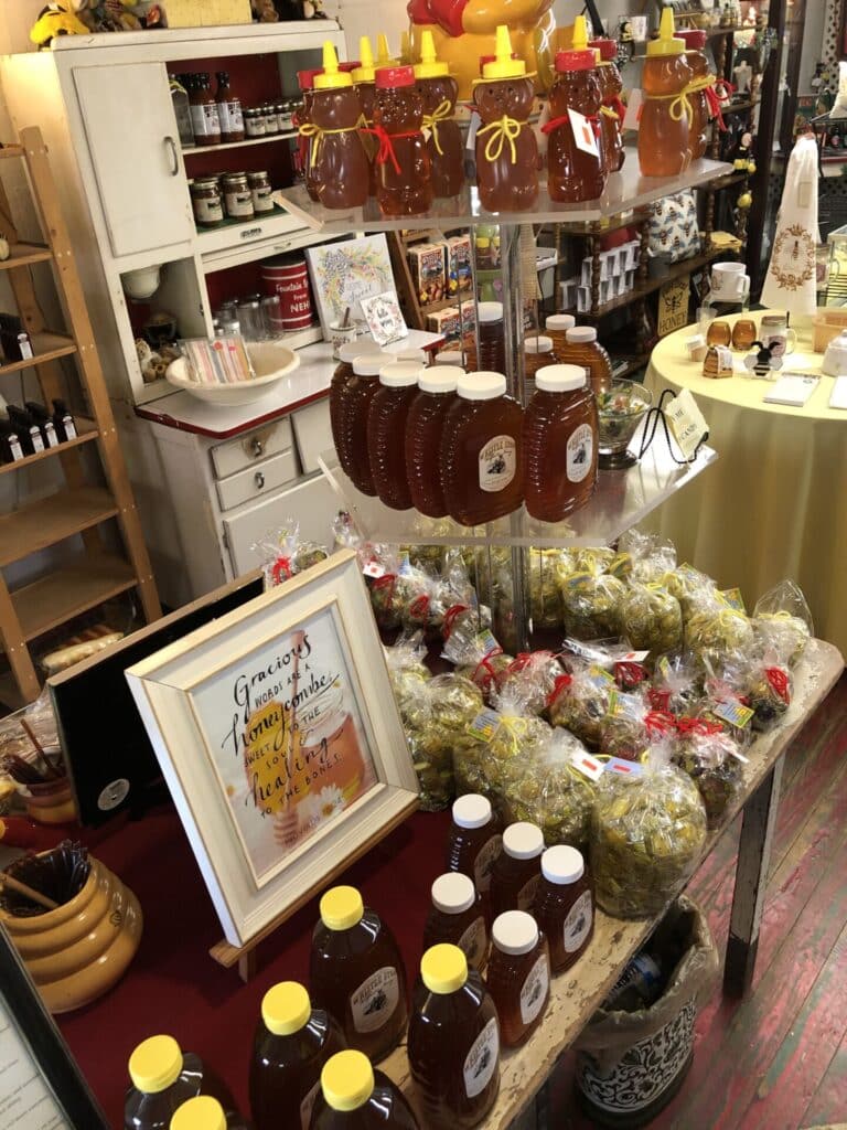 Interior of a store with honey products on display - The Honeycomb in Historic Juliette, GA home to Fried Green Tomatoes